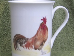 From a small range of personal mugs featuring the artists Chickens